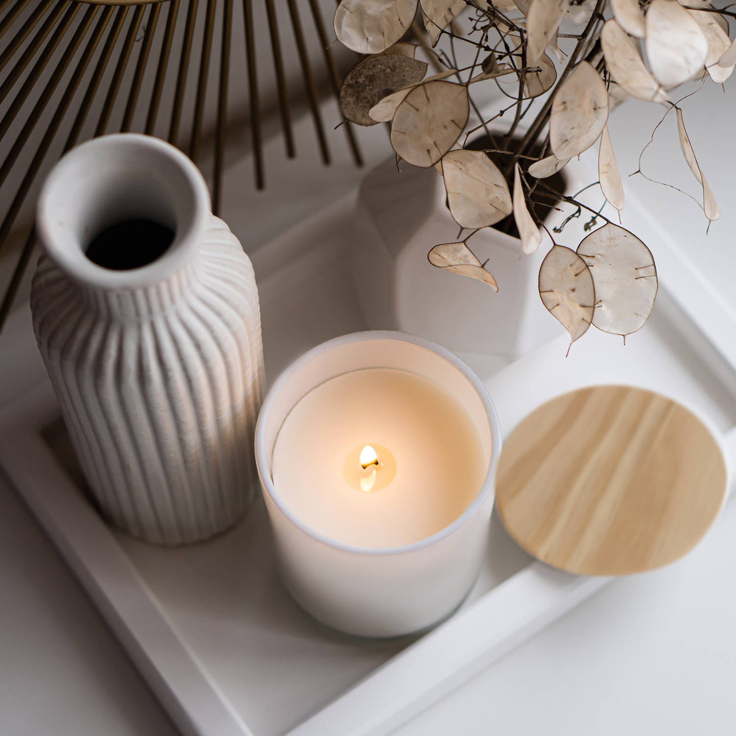 Luxurious white tray decoration, home interior decor with burning candle