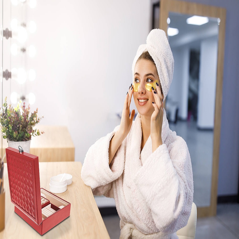 Young beautiful girl cares for the skin using patches under the eyes at home.