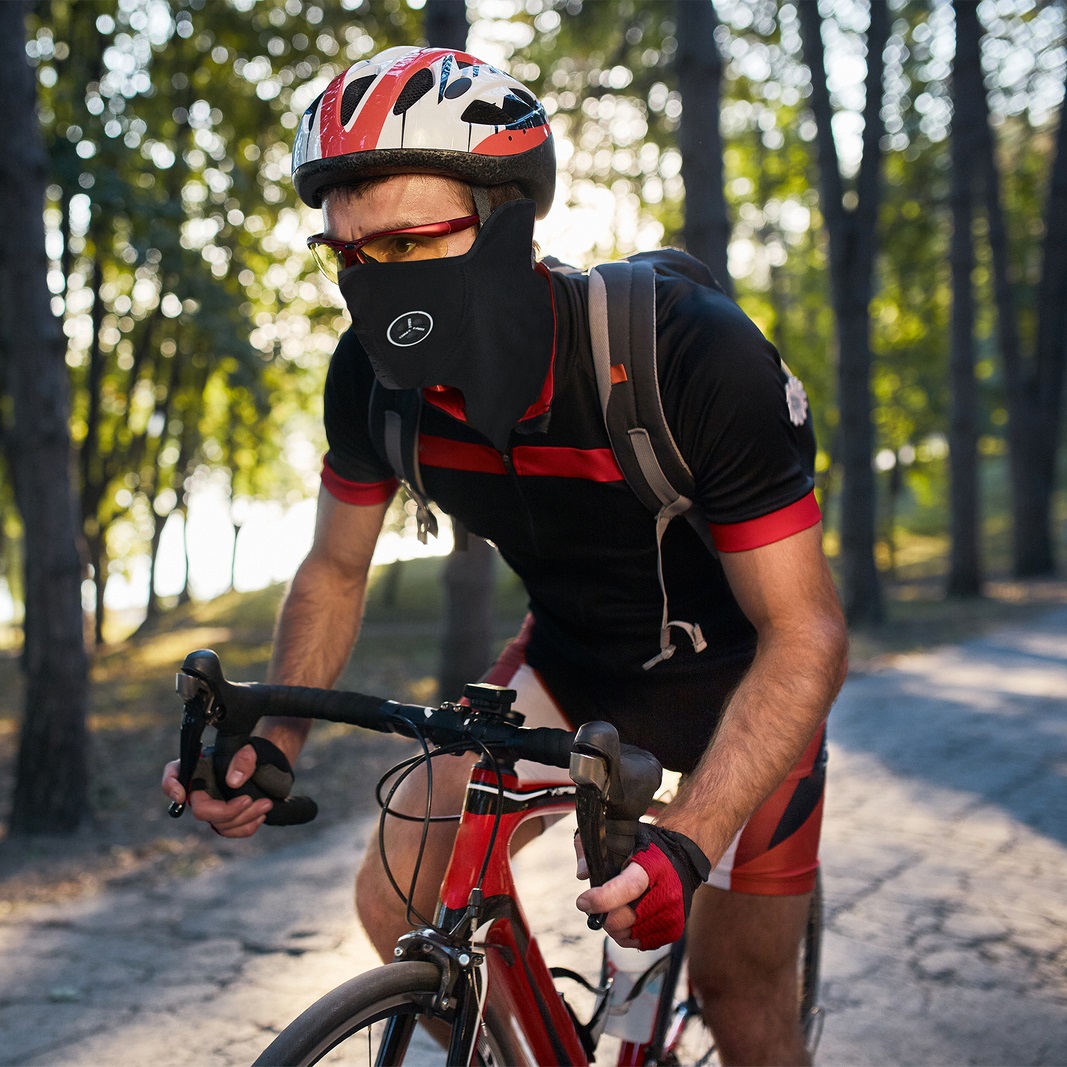 Young man are cycling road bike in the evening